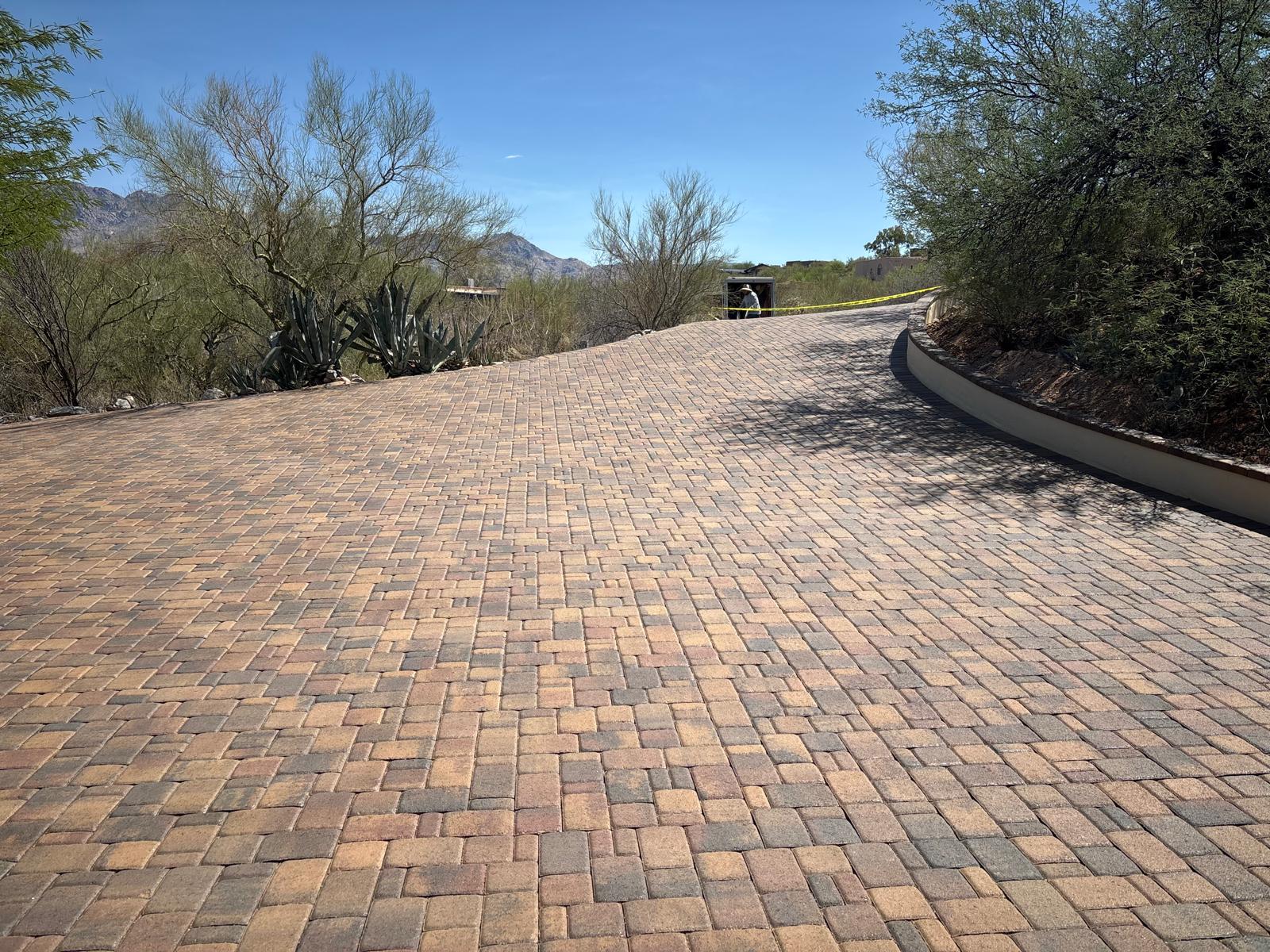 Tan herringbone brick paver driveway with mountain views in Arizona